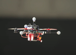 A Benchmark Comparison of Learned Control Policies for Agile Quadrotor Flight